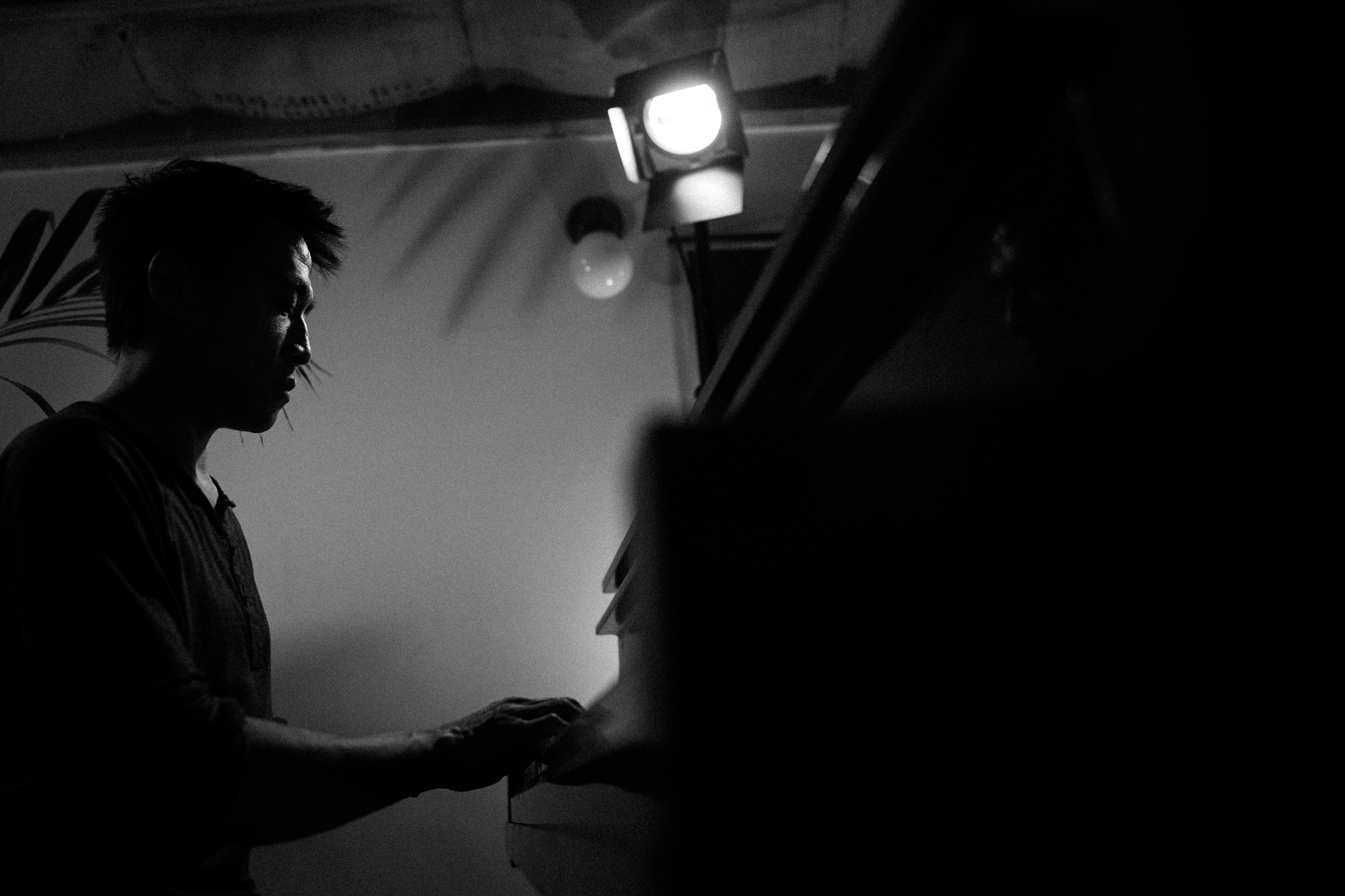 Photo of Eric Pan at piano during solo concert at The Forest Room, Berlin
