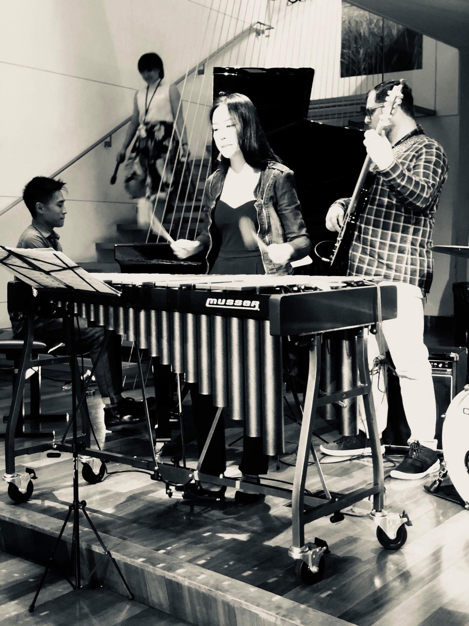 Photo of performance with Chien Chien Lu, Michael Feinberg, Sebastian Chiriboga, near Times Square in New York Citye Website Builder